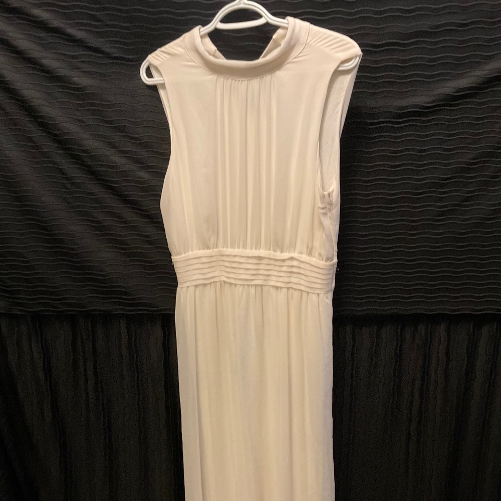 Long off white sleeveless dress